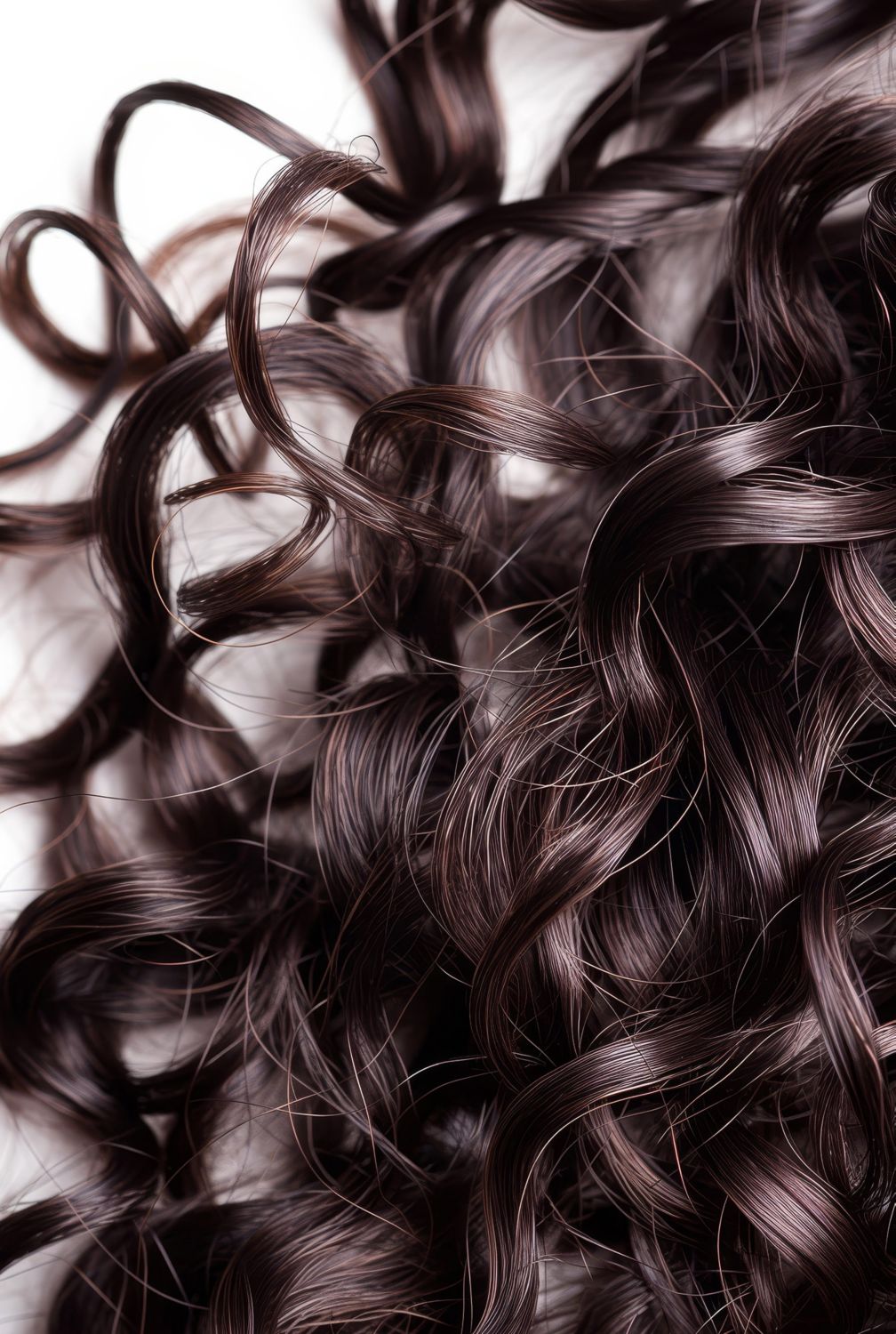 macro image of curly, permed hair
