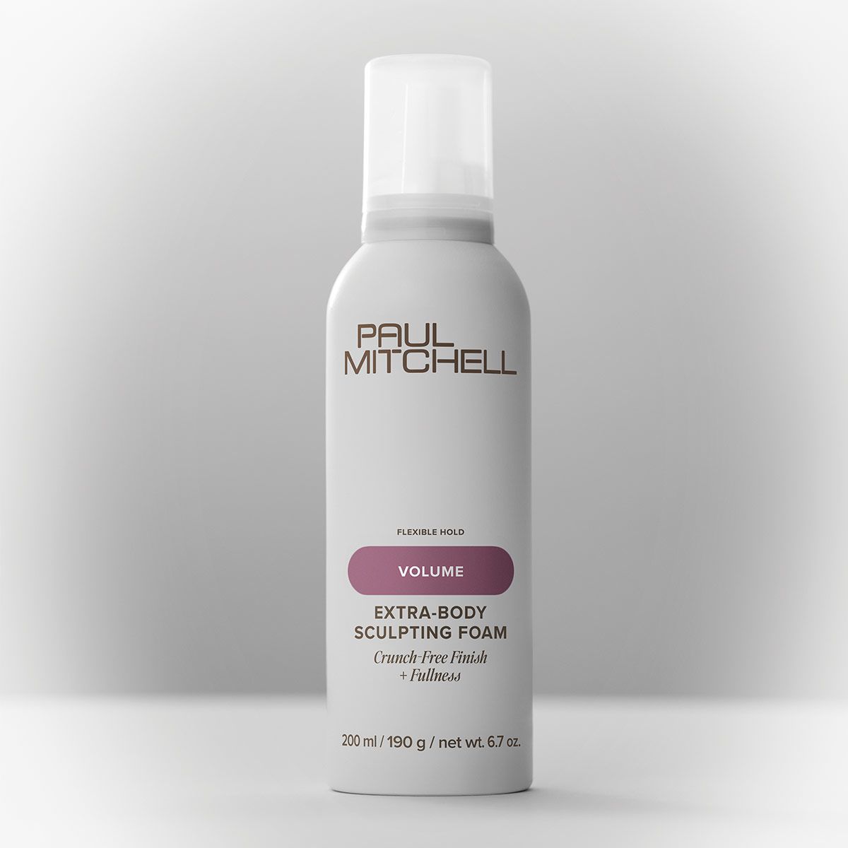 a bottle of Extra-Body Sculpting Foam