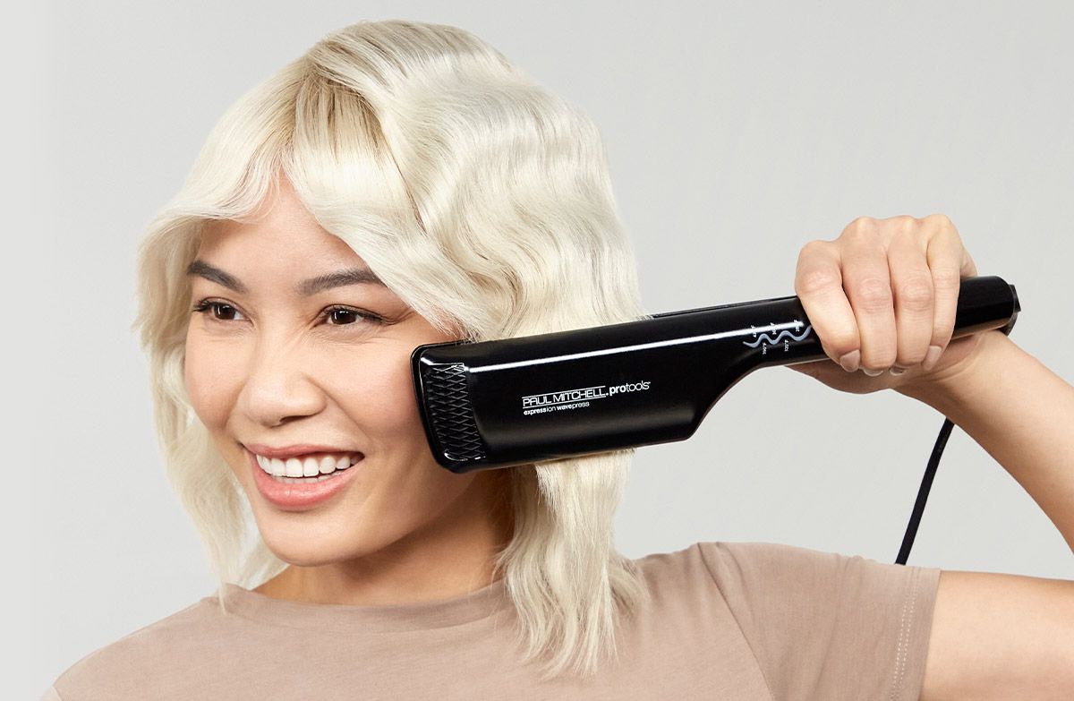 Model with Express Ion Smooth Flat Iron