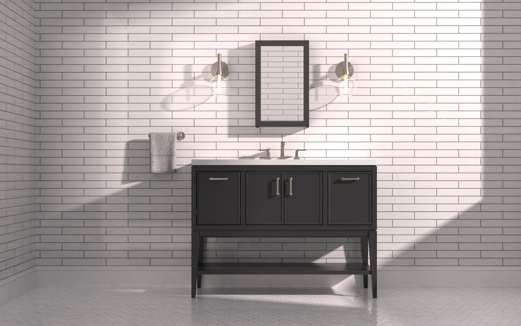 Daylight in white subway tiled bathroom featuring dark Winnow vanity with white countertop and small mirror hung between two illuminated wall sconces.