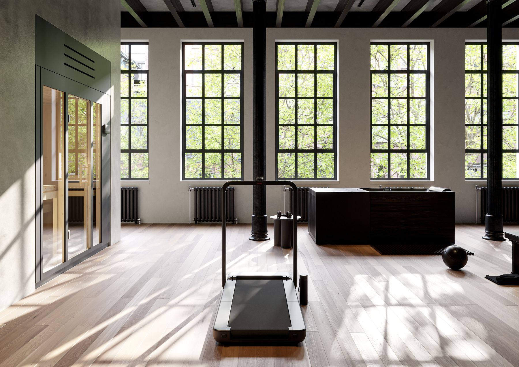 Bright, open wellness space with a treadmill, an ice bath, and a glass sauna surrounded by large industrial-style windows.