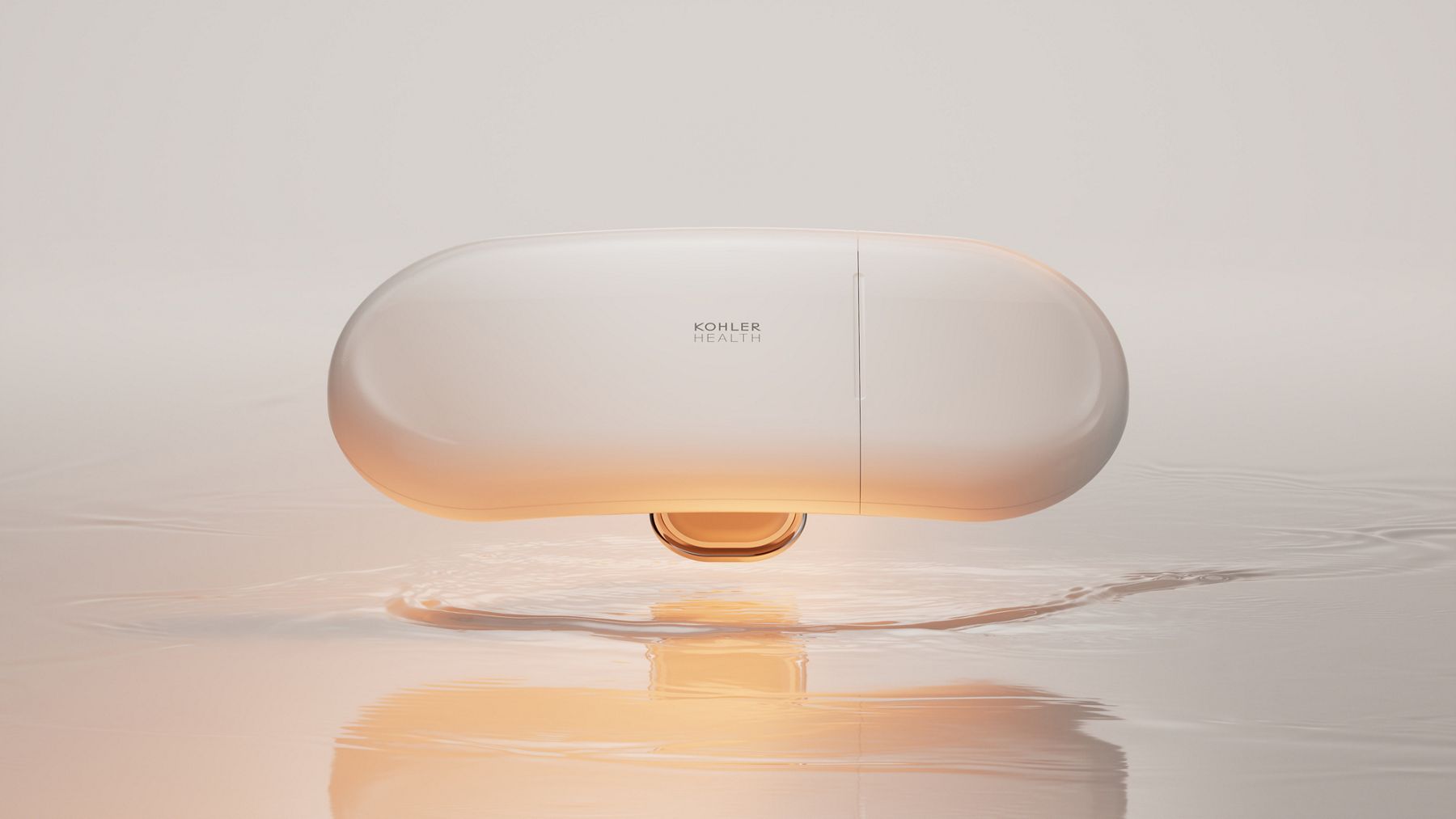 Dekoda health tracker attached to the rim of a white toilet seat.