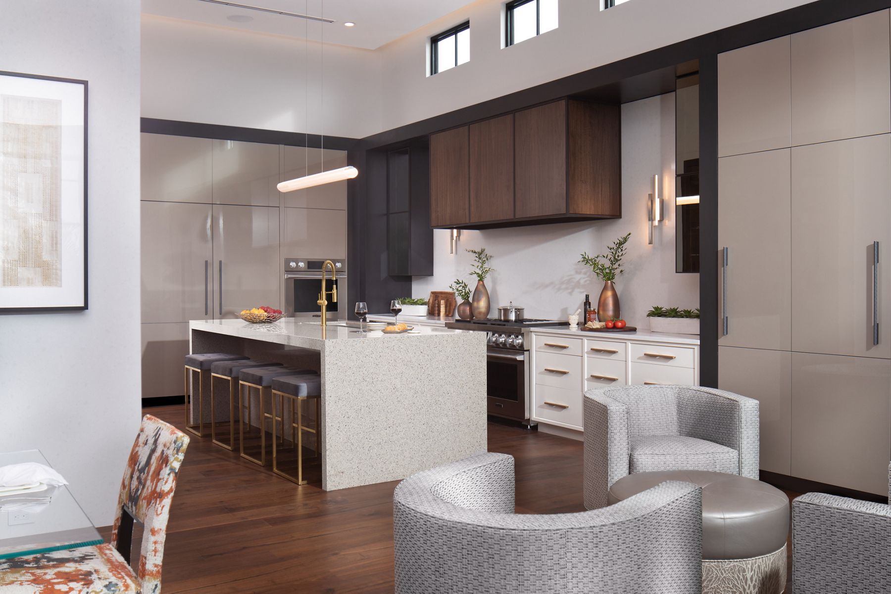 Daylight in large modern kitchen featuring large island and Vibrant Brushed Moderne Brass accessories.