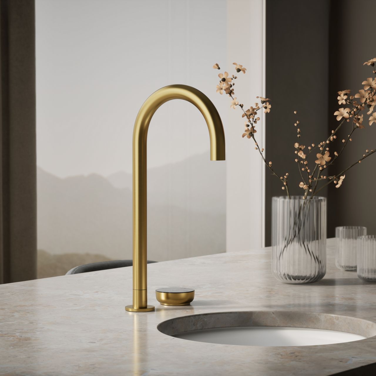 Contemporary gold Aquifer Faucet in a bright air kitchen with a view of mountains.