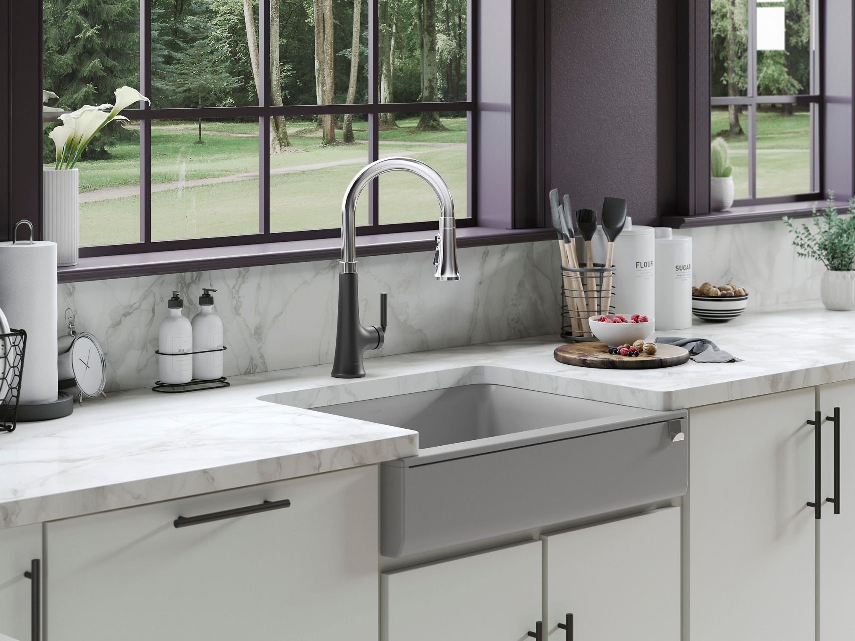 Close up of a faucet showing the two-tone polished chrome and matte black finish