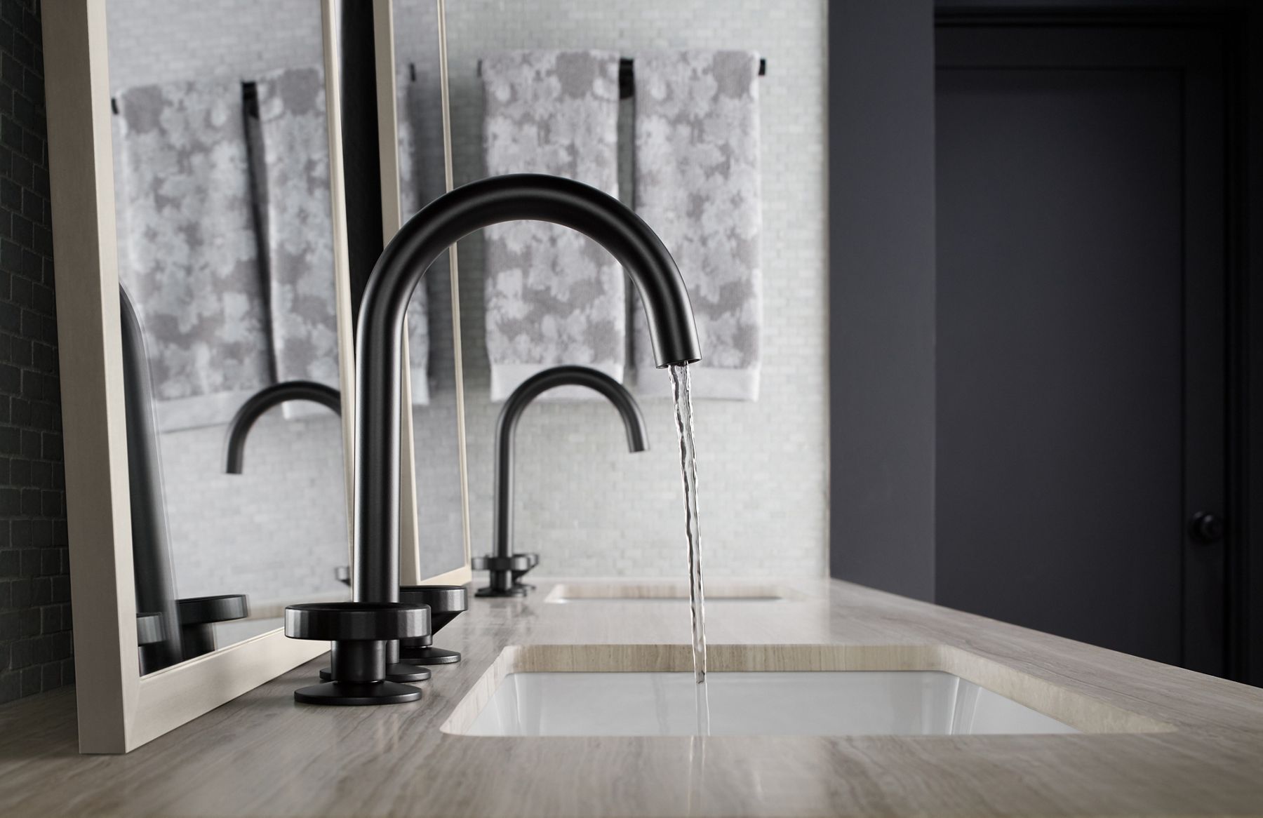 Side view of a faucet in Matte Black.