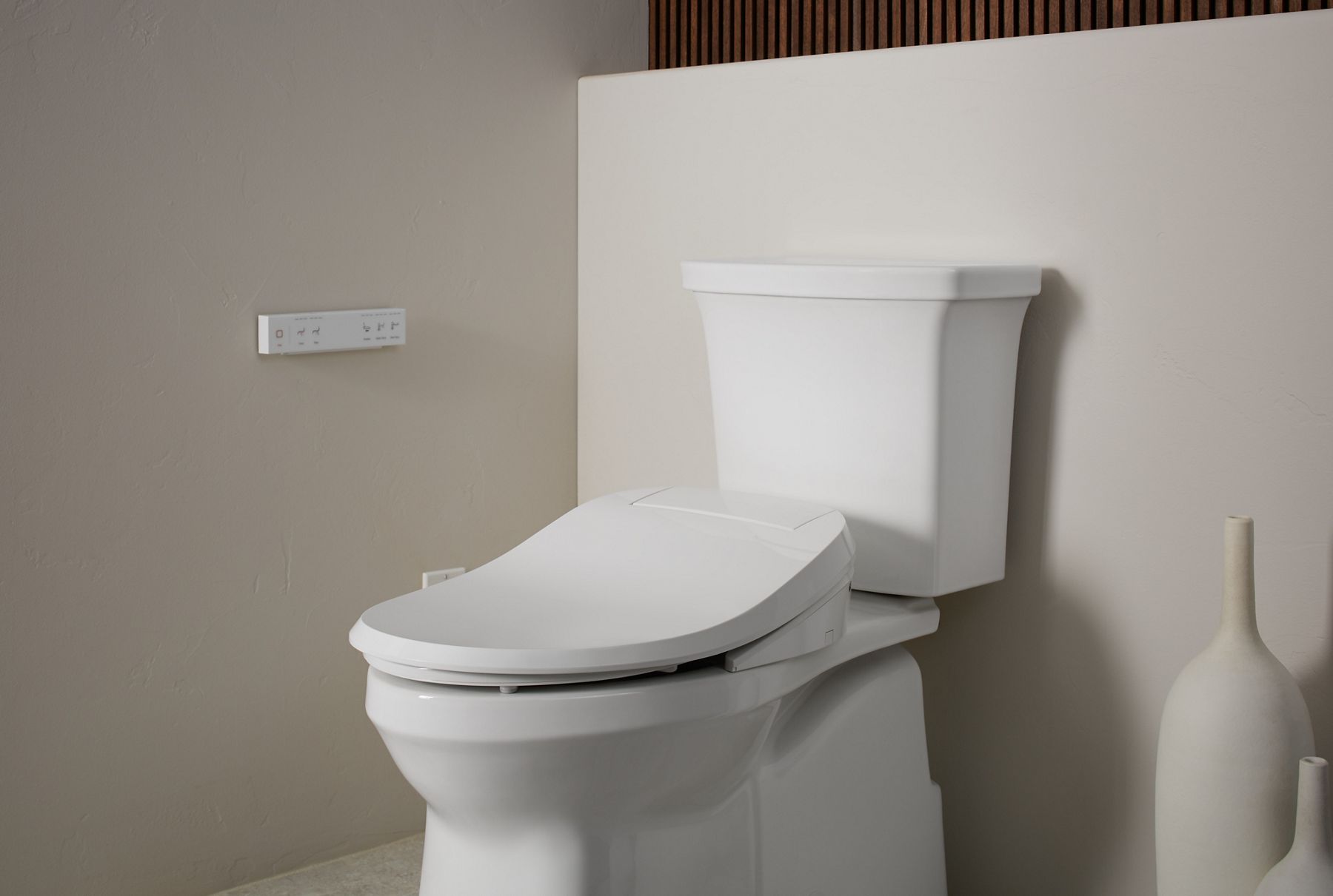 Angled view of a C3-430 bidet seat on a toilet.