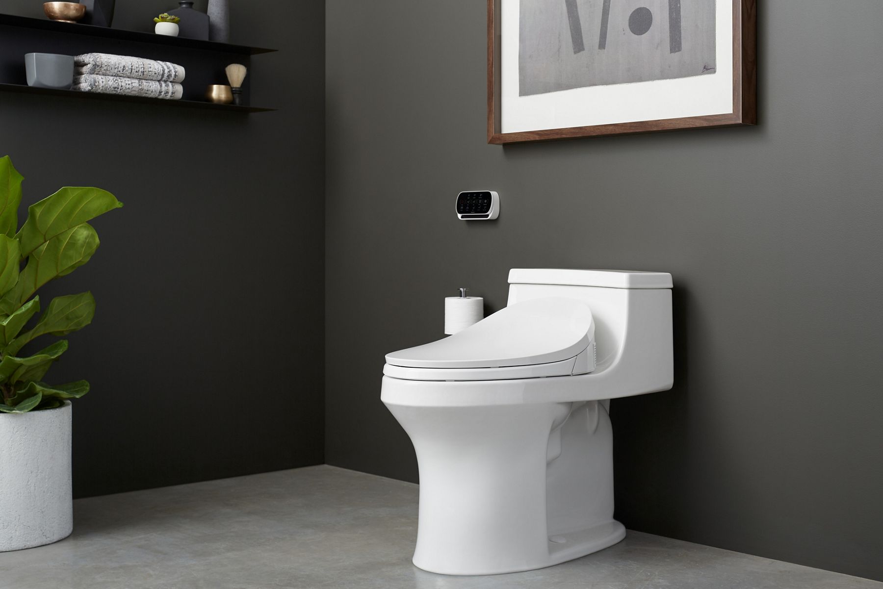 Angled view of a C3-230 bidet seat on a toilet.
