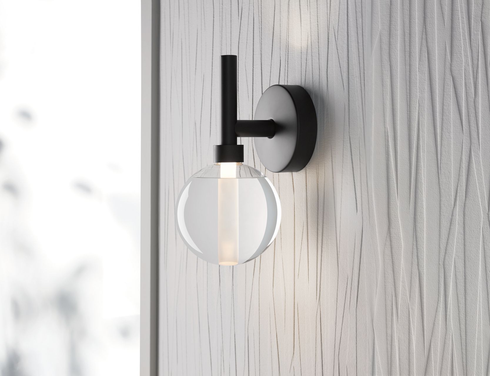 A one-light Components lacemaker sconce