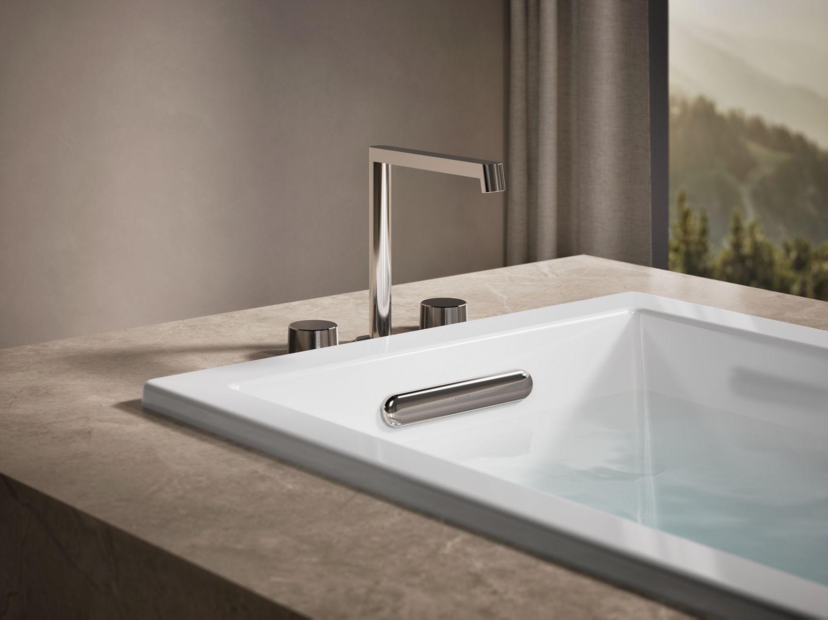 Modern bathroom  with a bathtub and chrome fixtures.