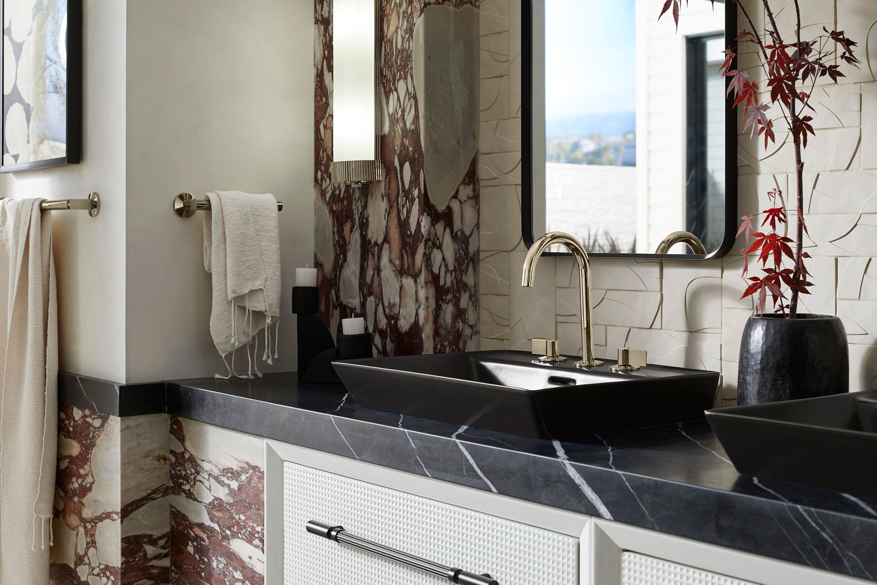 Luxurious marble shower with matte black rainfall showerhead.
