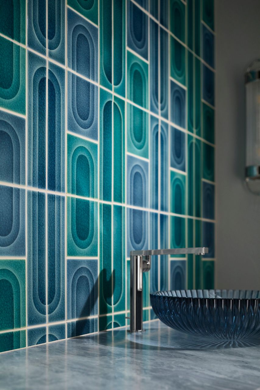 KOHLER WasteLAB® Transcendence Tile Collection with bold blue geometric tile designs.
