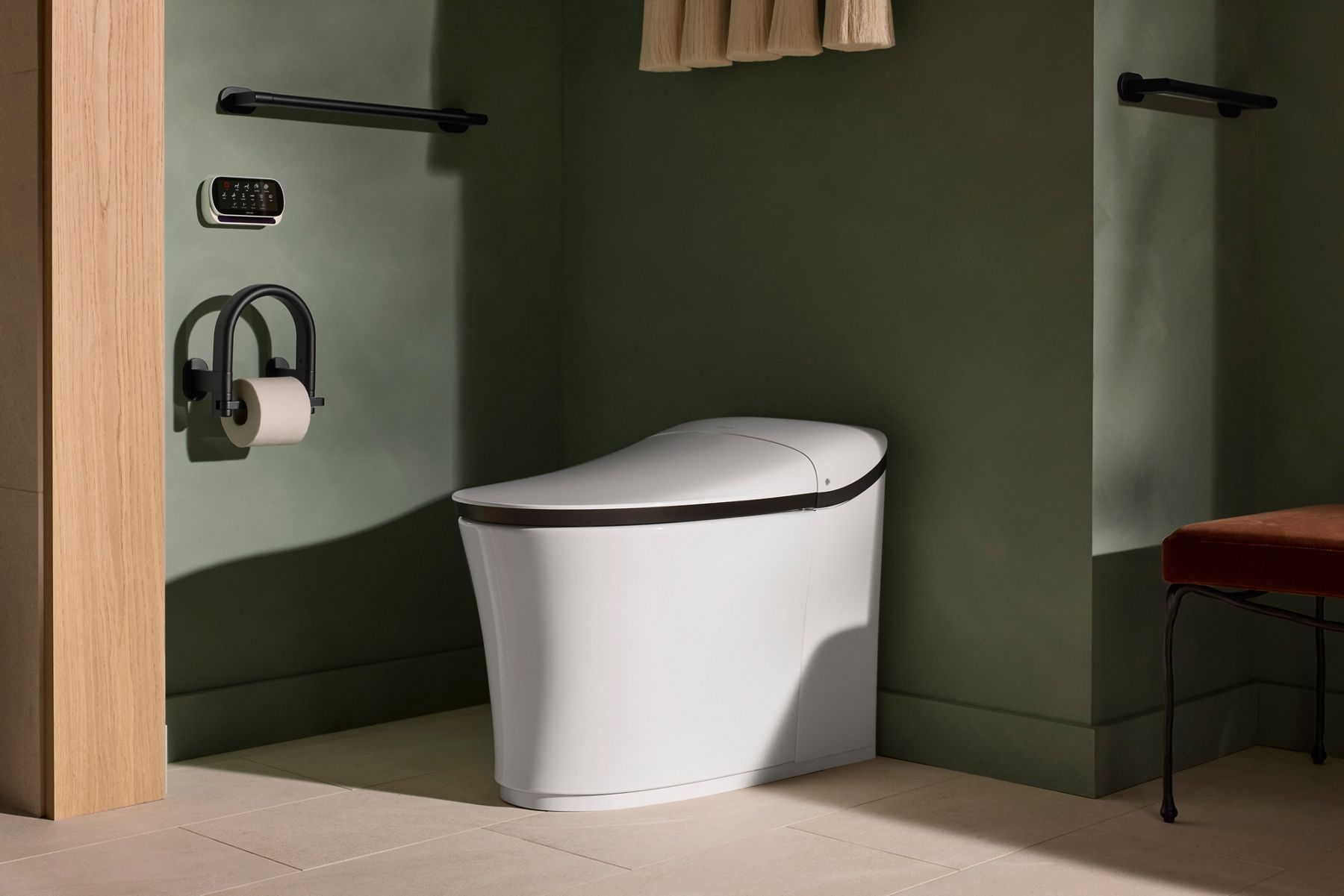 Modern white smart toilet in a minimalist bathroom setting.