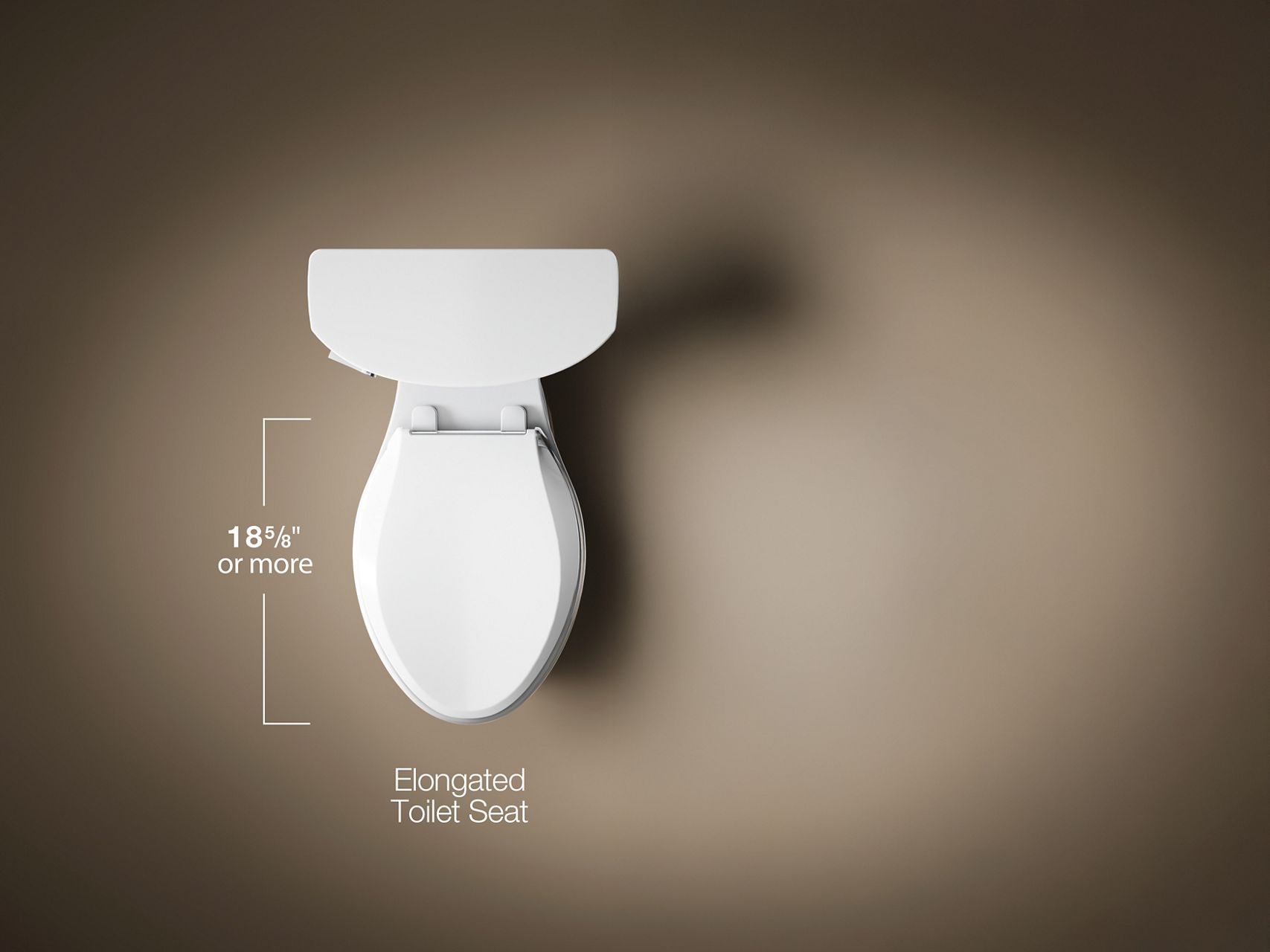 Elongated white toilet bowl with measurement guide showing 18.5 inches or more.