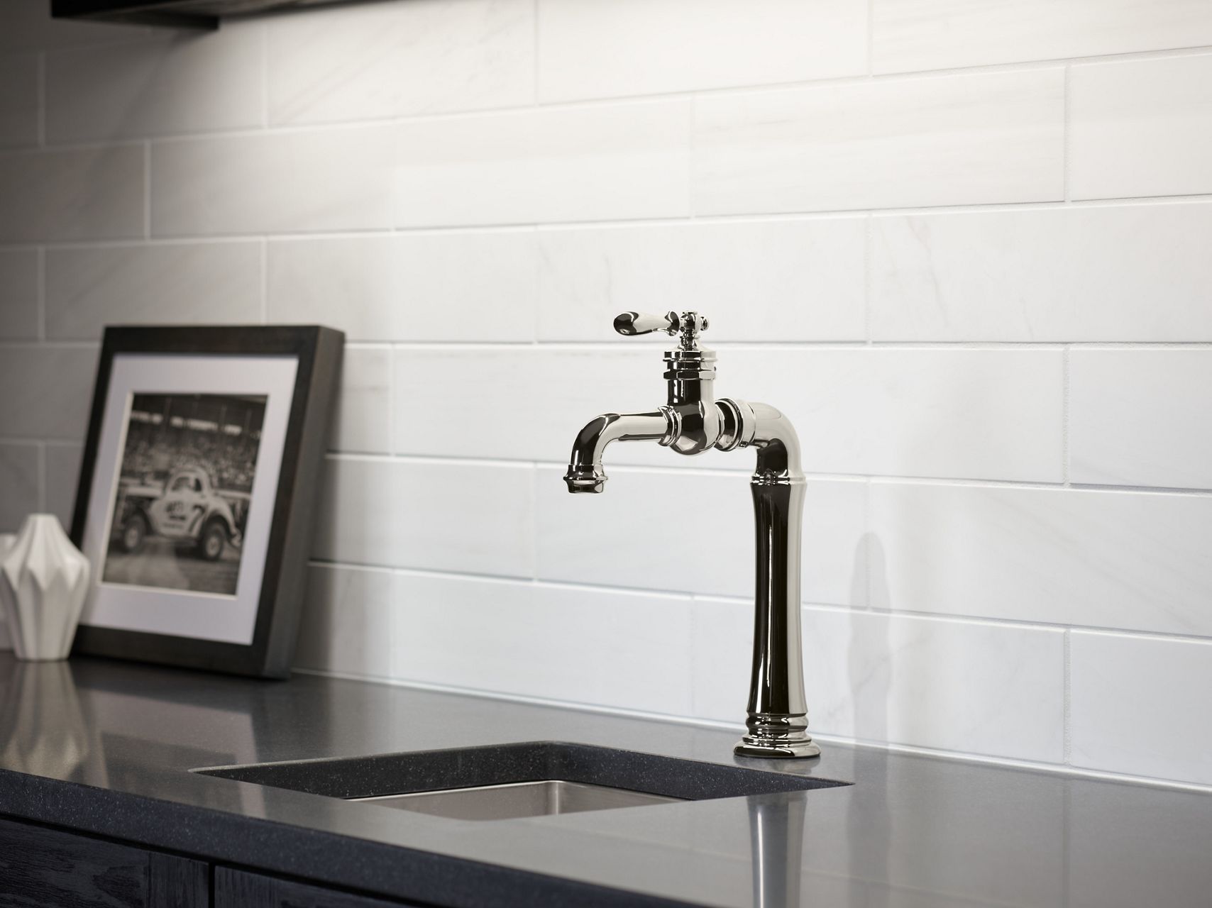 An Artifacts bar faucet in stainless steel