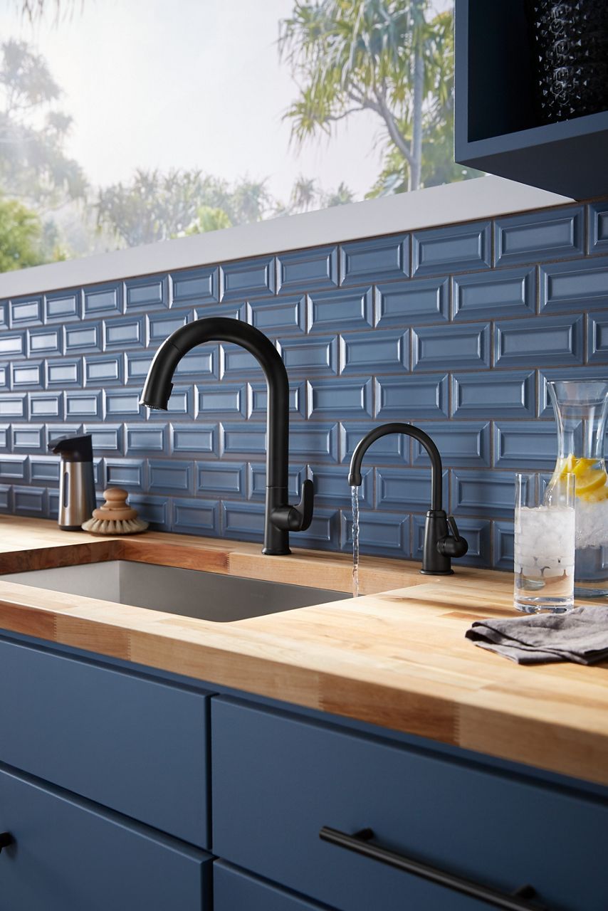 A Wellspring beverage faucet in matte black