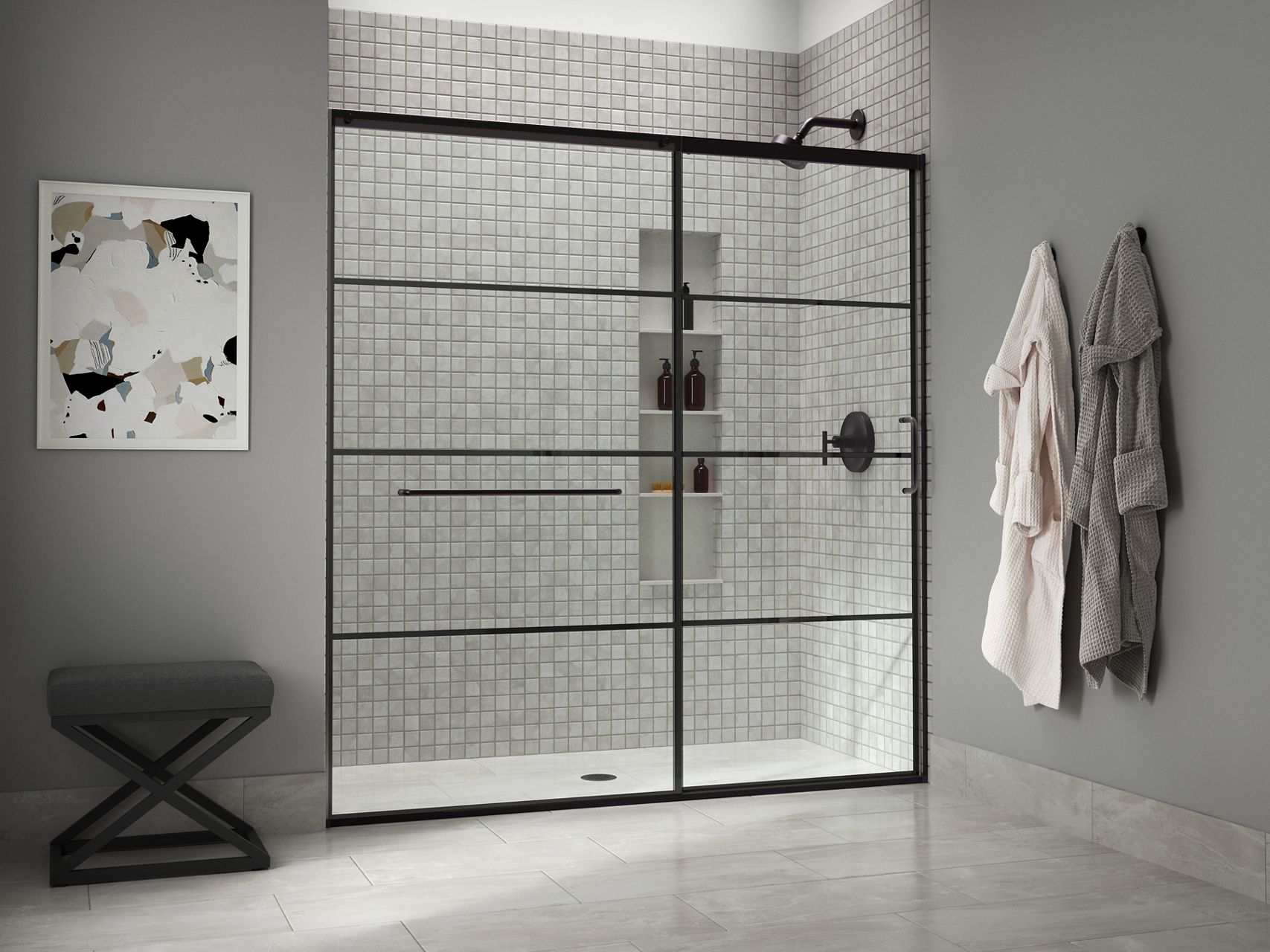 A modern shower with a matte black, paneled sliding door, gray tile walls and matte black accessories