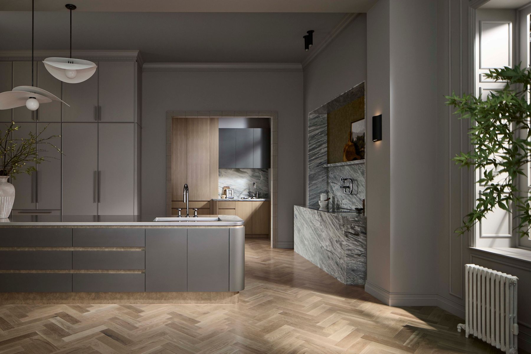 Modern kitchen interior featuring a sleek marble island and integrated Pull-Down faucet in brushed nickel finish.