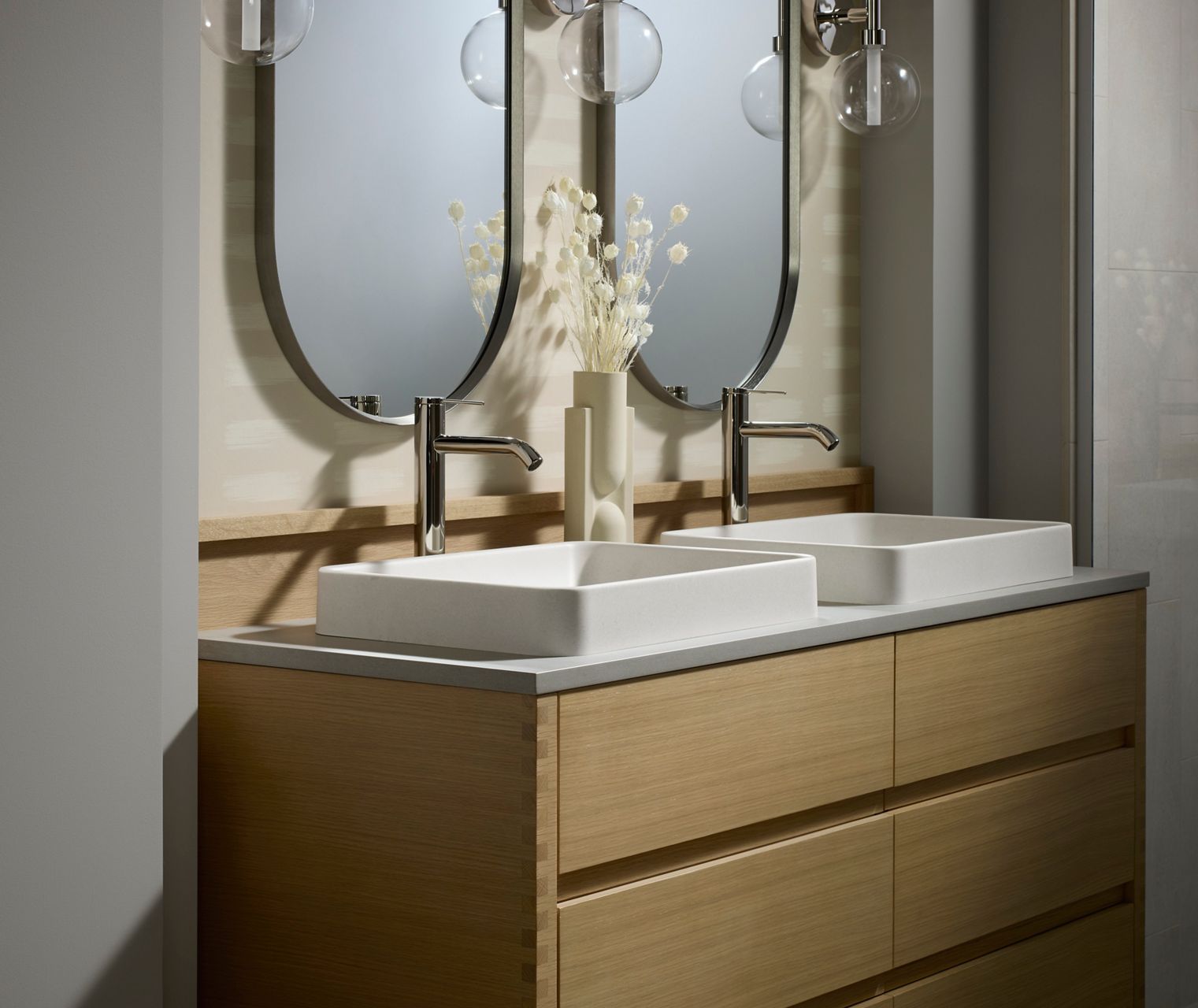 Modern double vanity with marble countertop and brass facuets