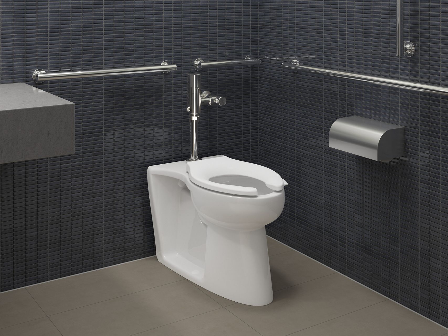 A Modflex adjust-a-bowl toilet and flushometer in a bathroom with brown floors and dark blue tile walls.