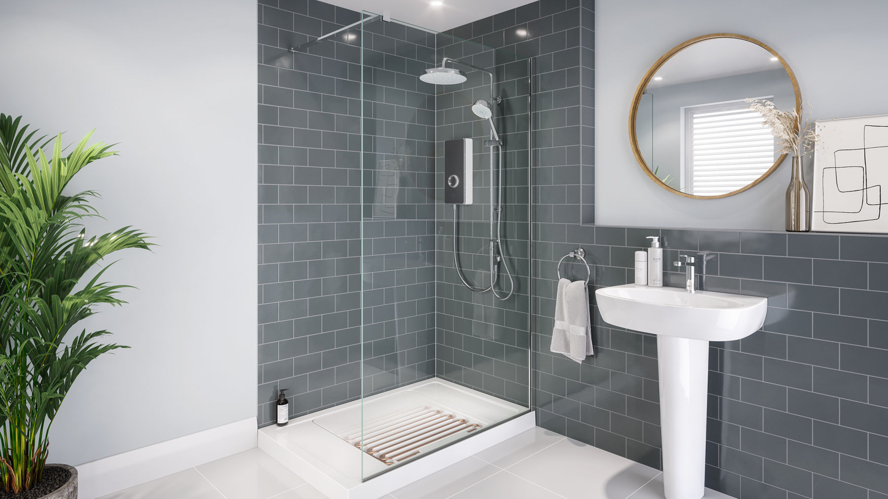 A Mira Vista Heatloop shower above a shower tray in a modern grey and white tiled bathroom