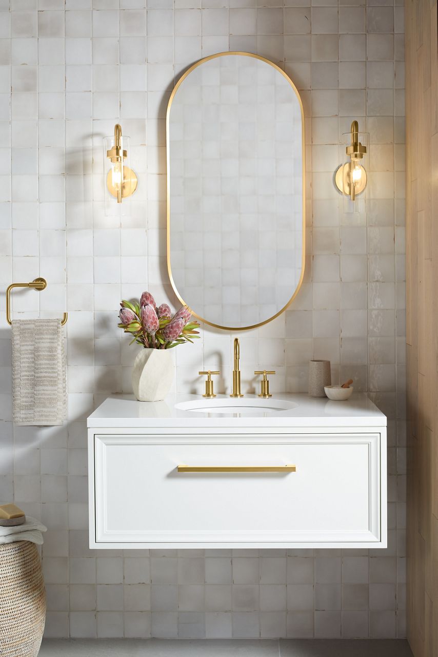 Wall-mounted white vanity with gold handle