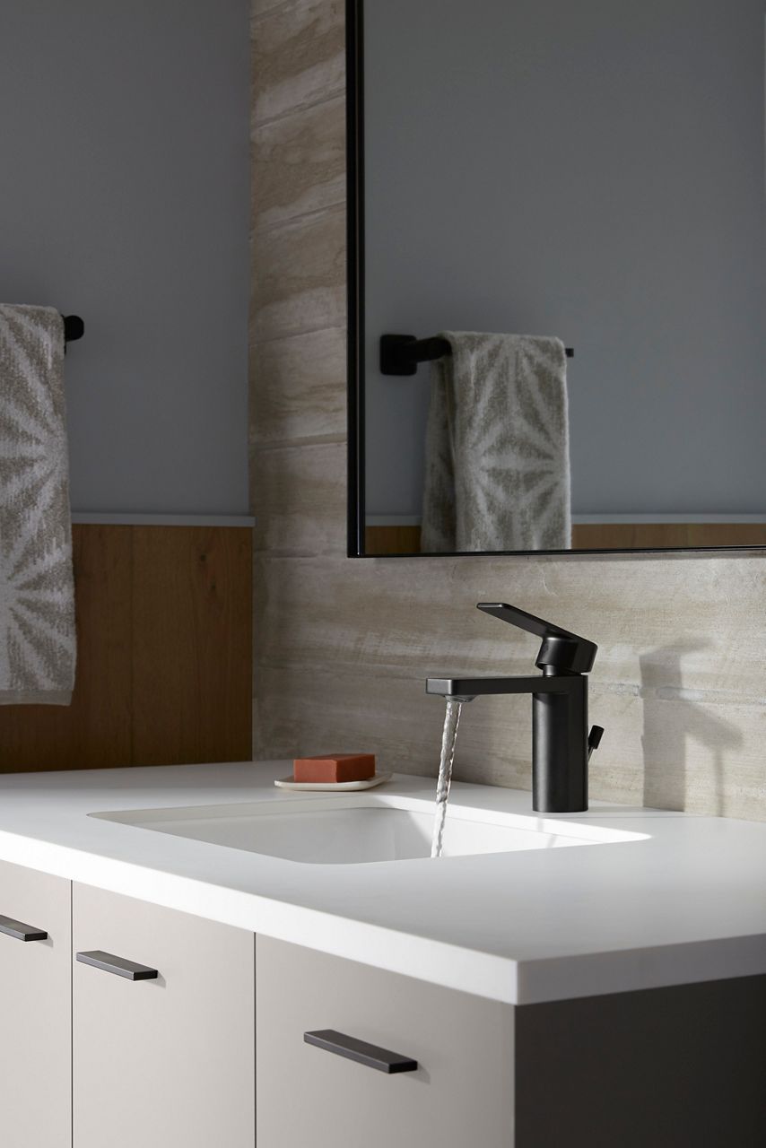 A modern single hold faucet in matte black with rectangular detailing.