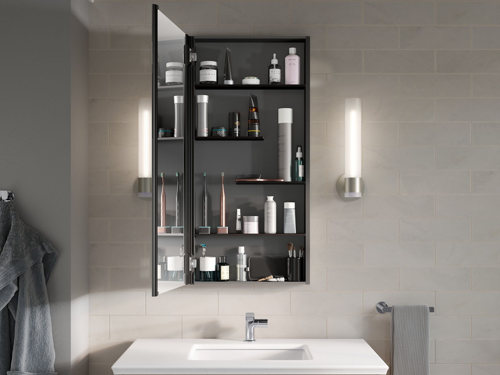 A medicine cabinet on a beige wall opened to reveal staggered shelving that contains personal hygiene items of various heights.