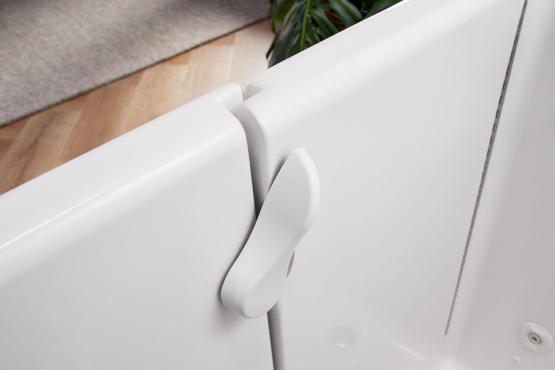A Kohler walk-in bath tub door