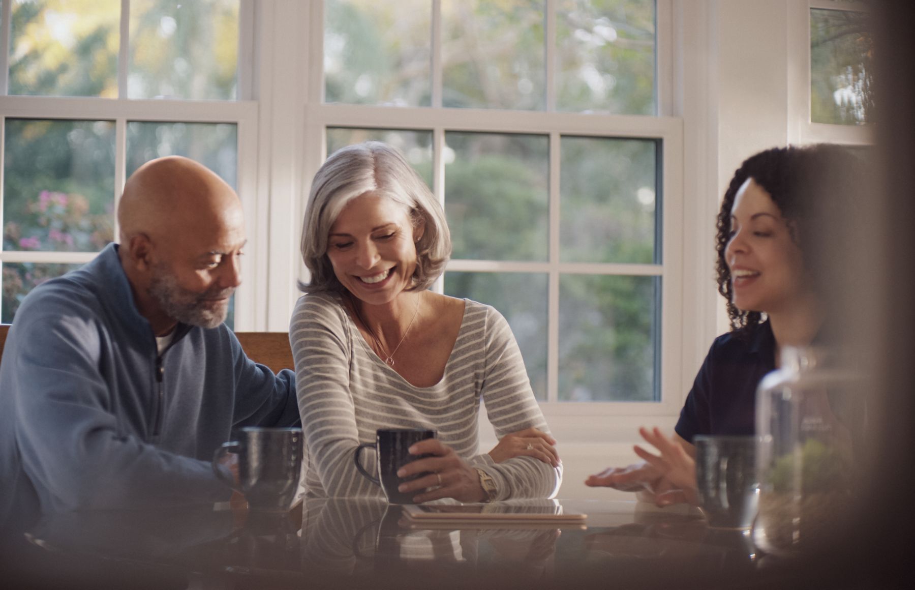 Customers meeting with Kohler expert discussing their free quote