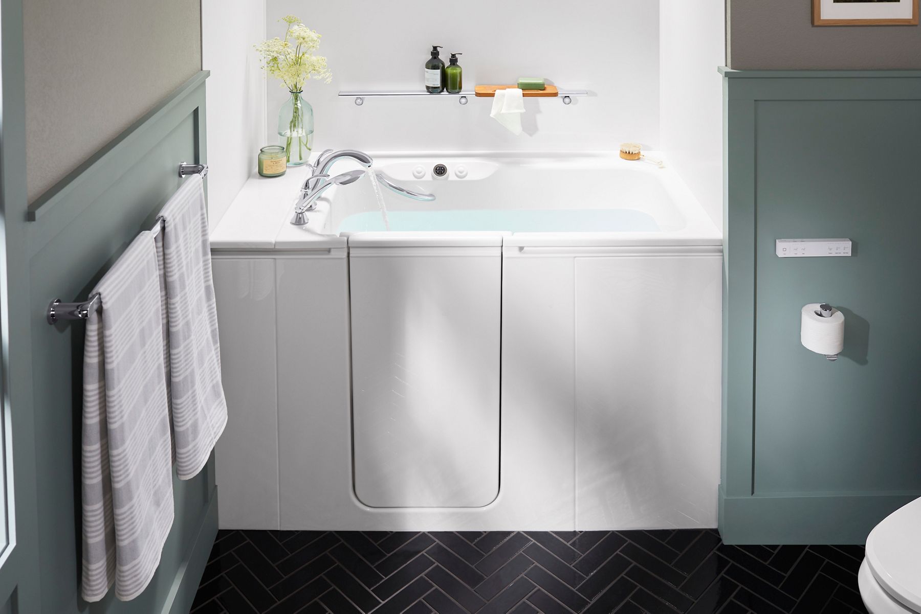 KOHLER walk-in bath installed in a residential bathroom