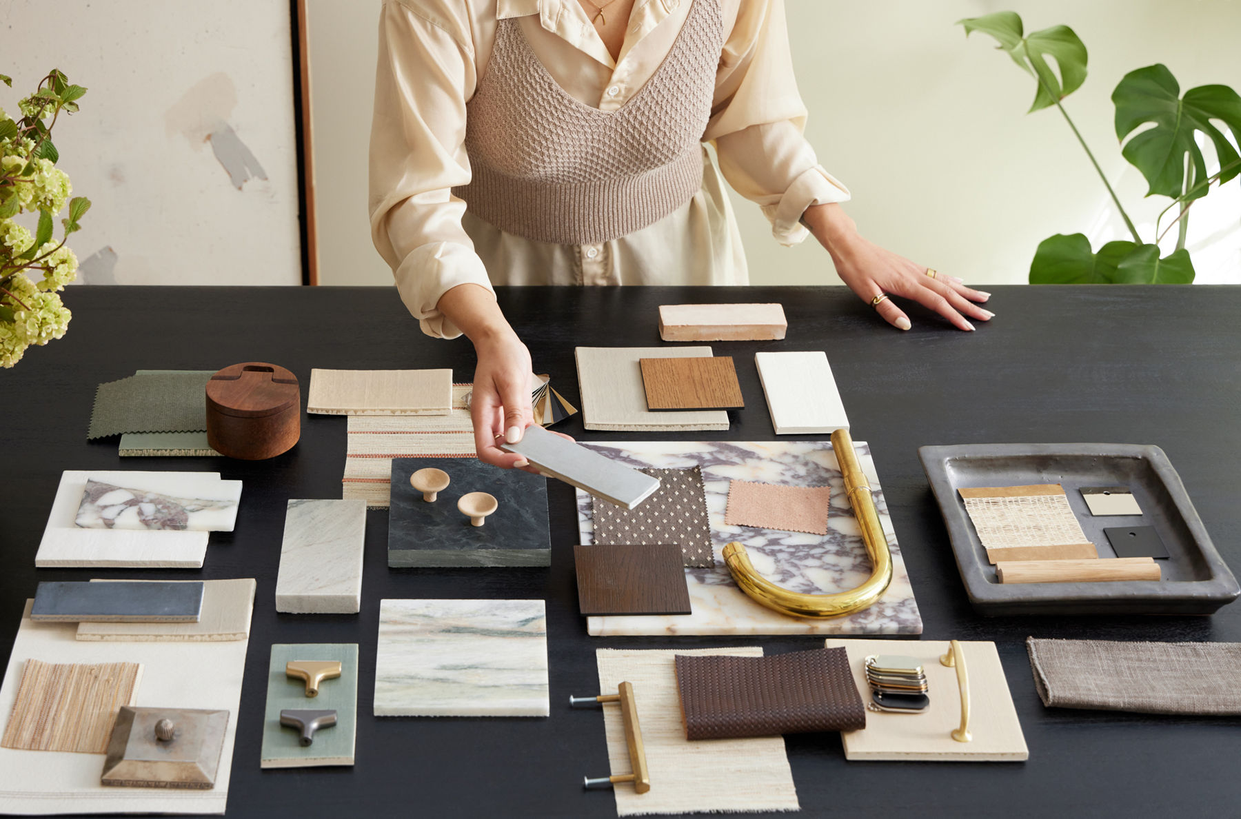 Trade program for designers highlighting premium material options such as wood textures, fabric patterns, and metallic accents