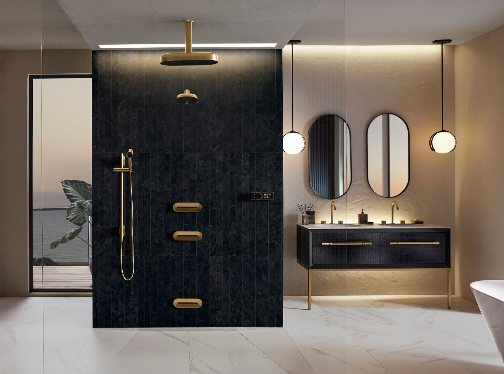 Contemporary marble shower with chrome handheld and clean glass partition.