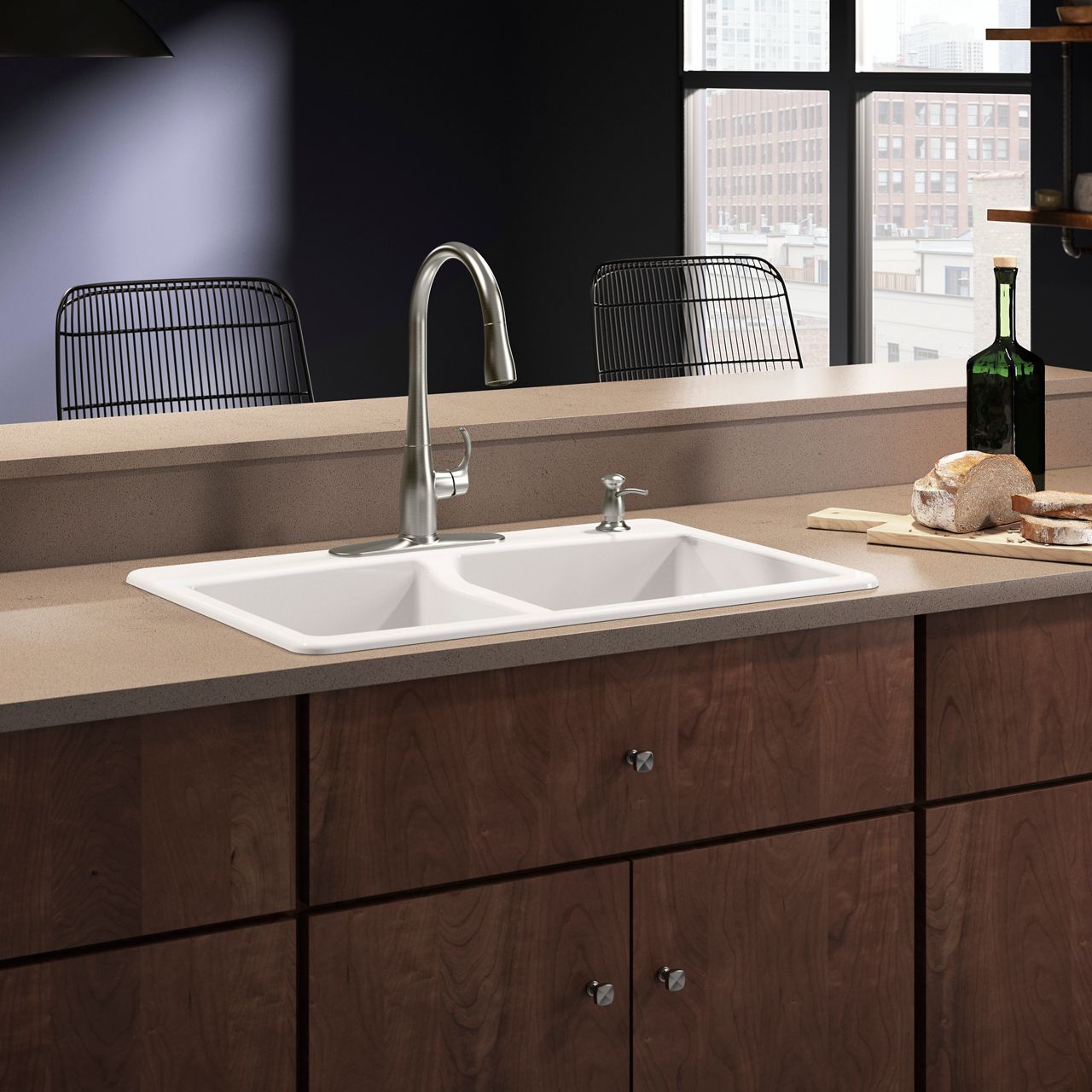 A stainless stee faucet with an escutcheon plate on a white sink with a brown counter top.