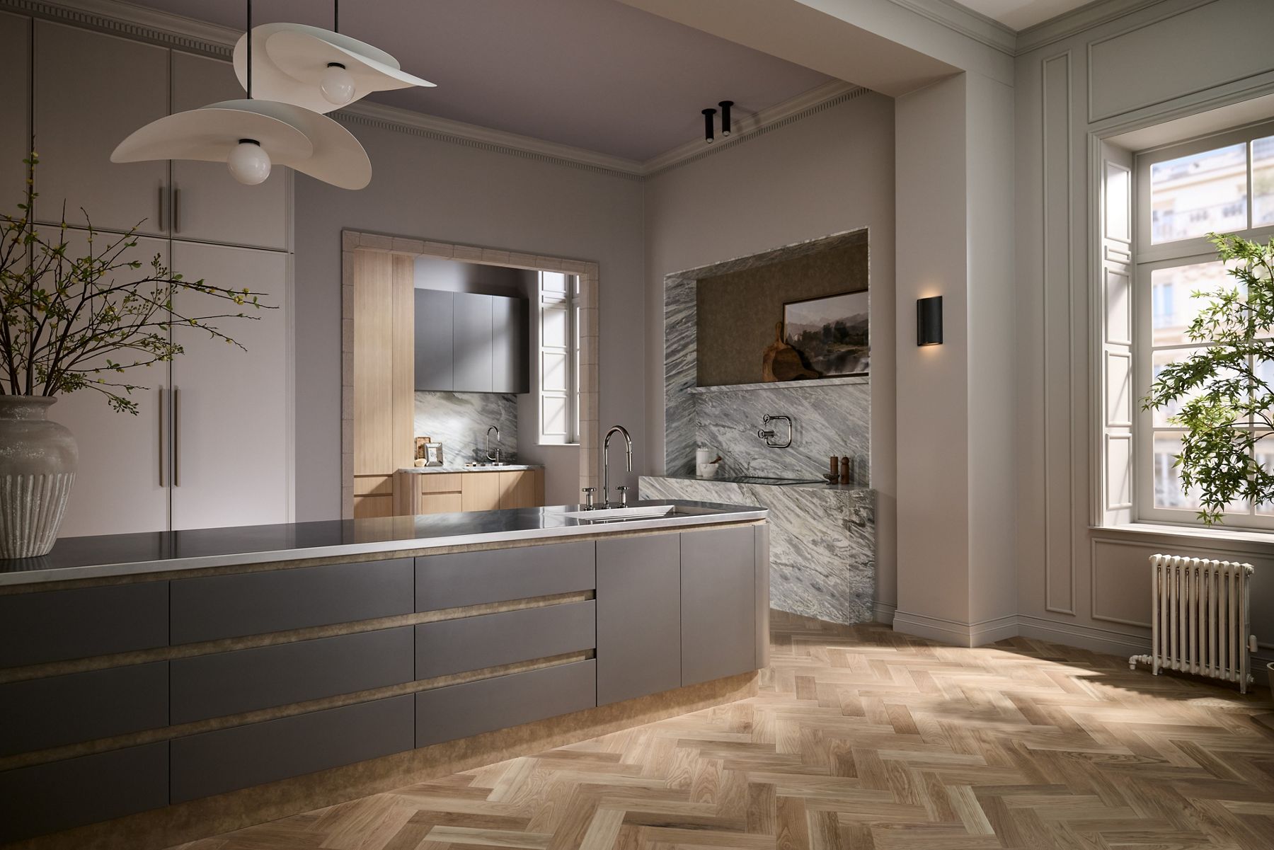 Spacious kitchen with wood parquet flooring, large island, marbled backsplashes, and sleek faucets.