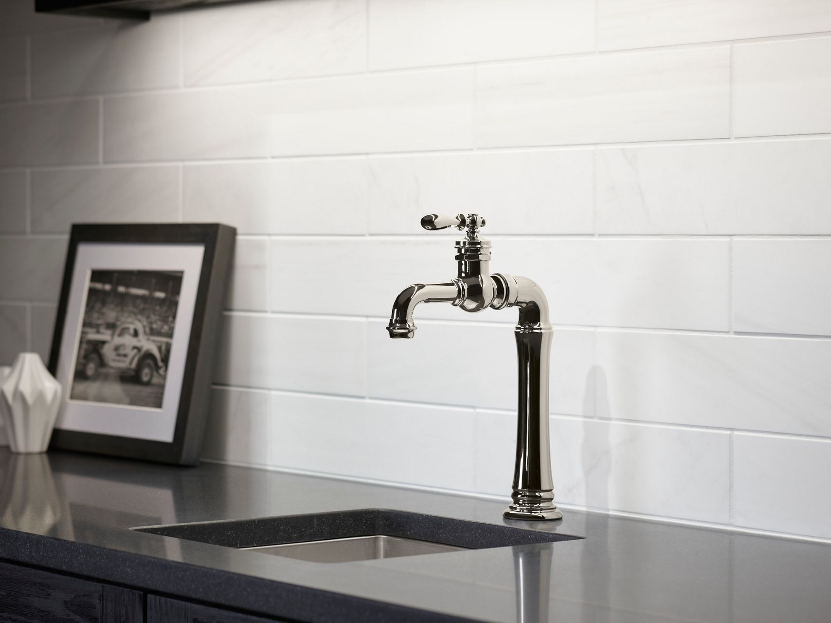 An Artifacts bar faucet in stainless steel