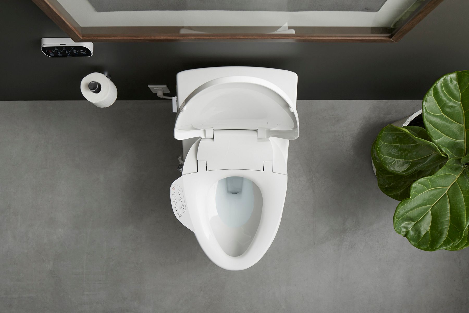 Smart white toilet with open lid.