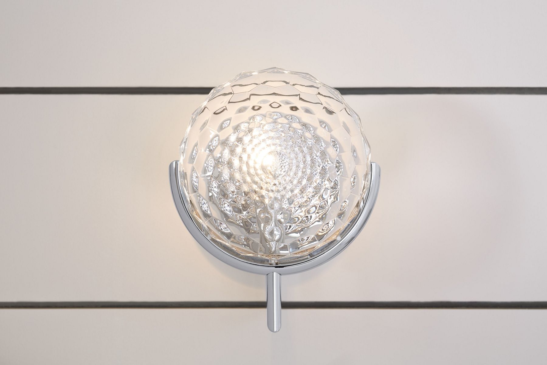 An Arendela single light sconce in brushed nickel.