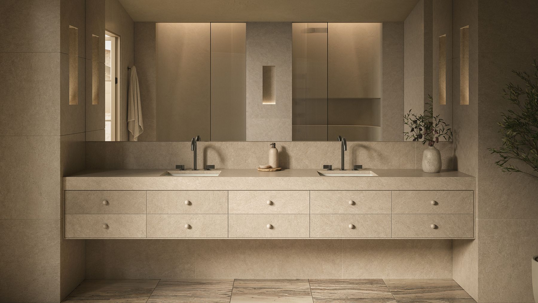 Modern minimalist double vanity with integrated sinks, light stone counter, and large mirrors in a neutral-toned bathroom.