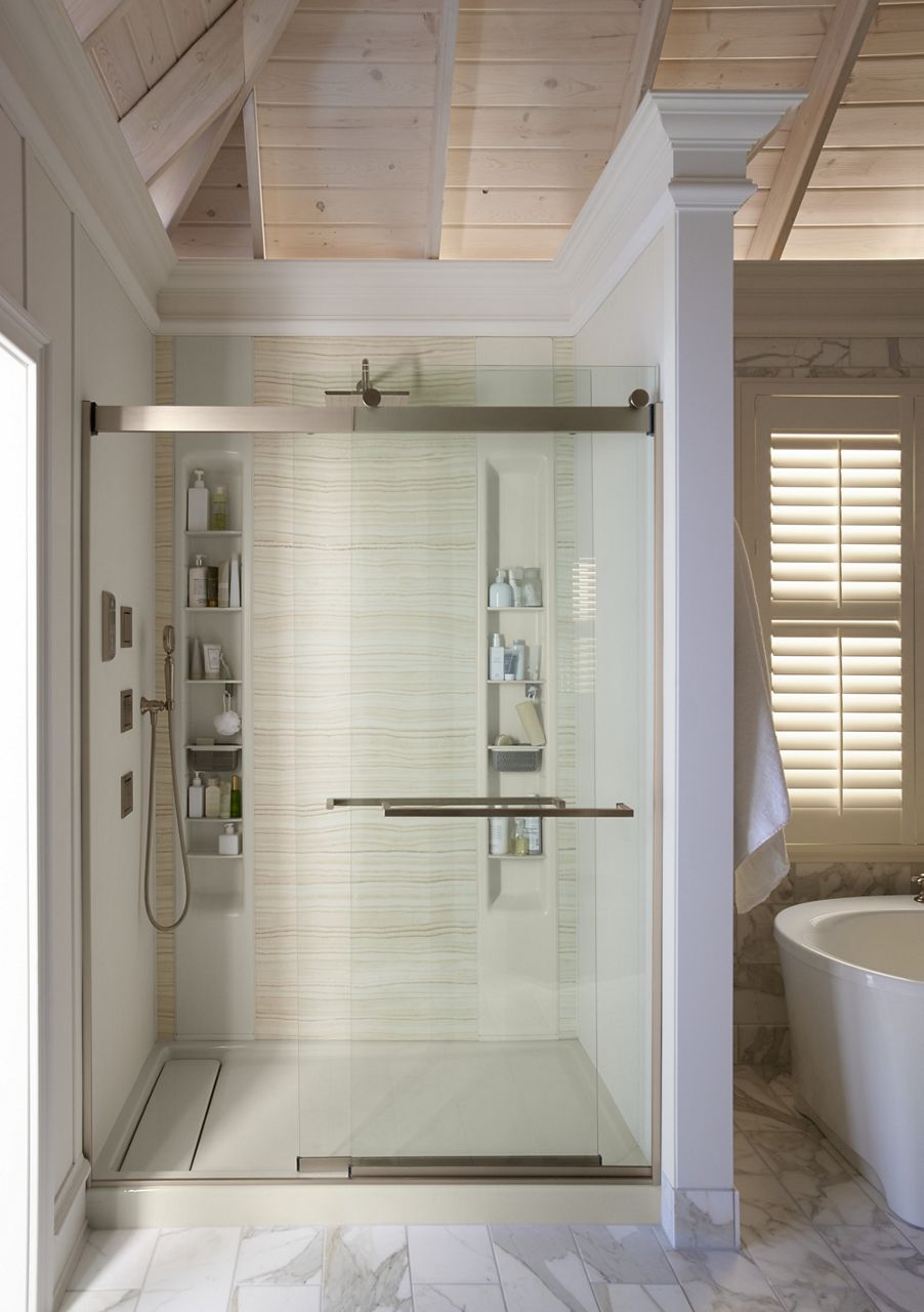 A moodboard featuring items that add sparkle and add dimension to a white-on-white bathroom