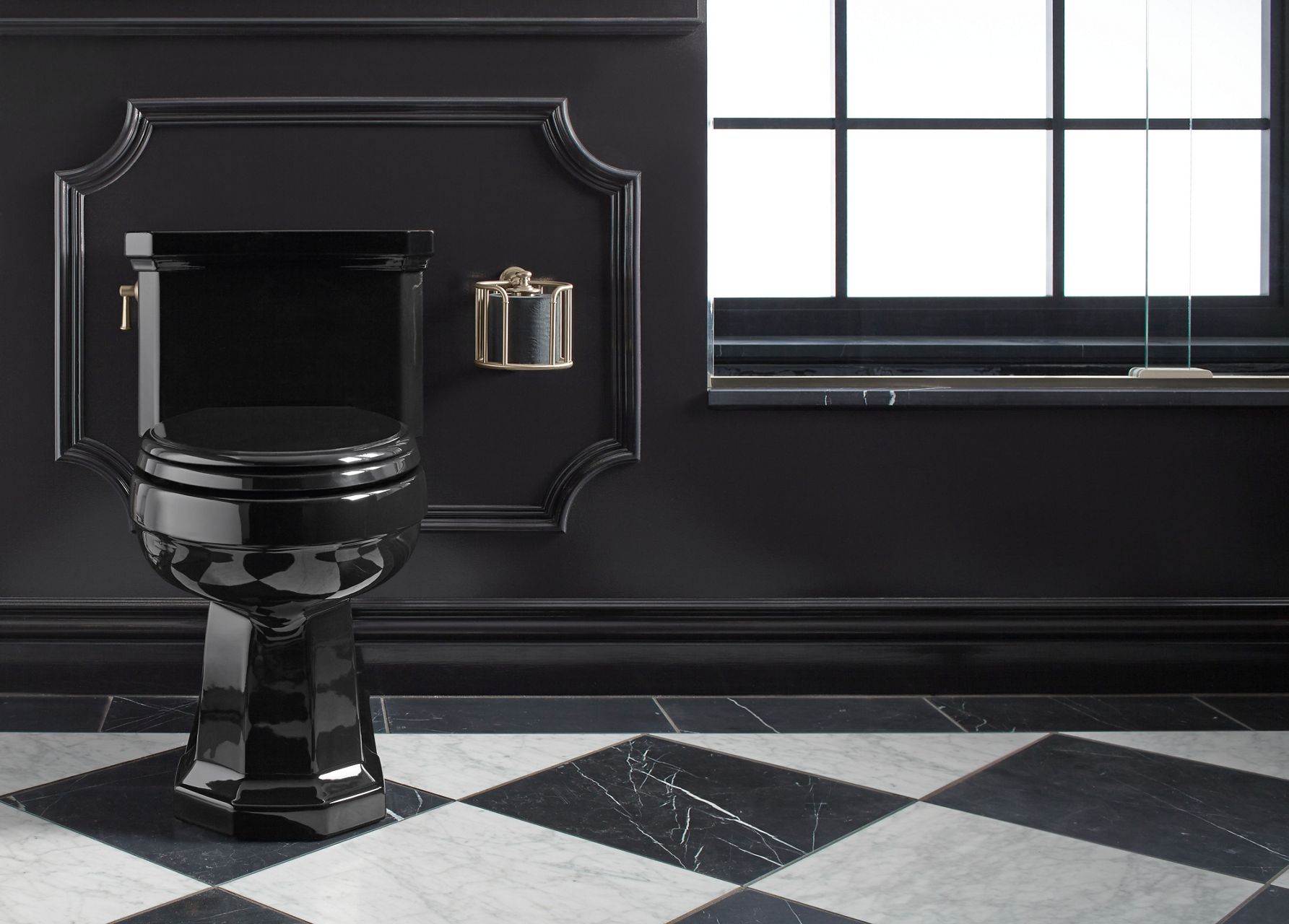 A bathroom with black and white checkered floors, black walls, and black KOHLER Kathryn Comfort Height toilet.