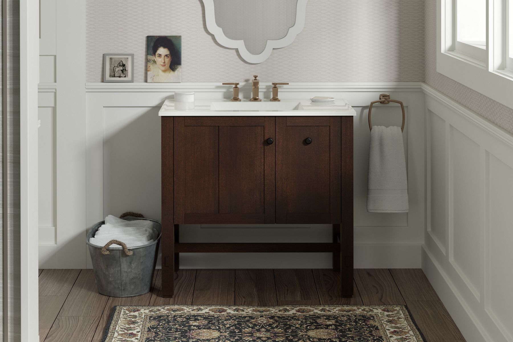 A Tresham vanity in the Woodland colorway with a brushed brass faucet and white counter top set in a traditional bathroom with paneled walls.