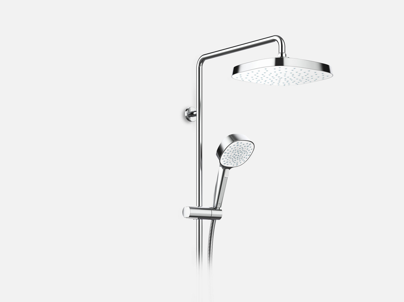Grey textured bathroom wall with Opero Deluge and Handset in Brushed Nickel.