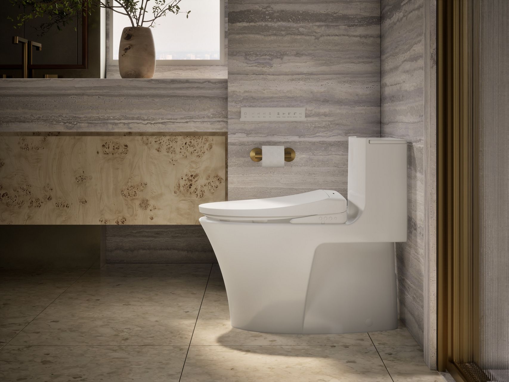 KOHLER one piece toilet with bidet seat installed, shown in a modern bathroom setting