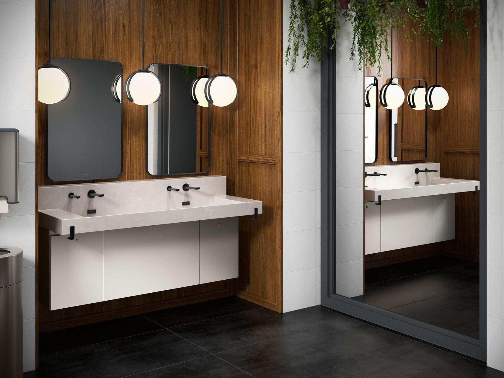 A sleek, modern commercial lavatory system with a white, solid-surface countertop featuring two integrated sinks. The vanity is paired with black, wall-mounted faucets for a minimalist aesthetic.