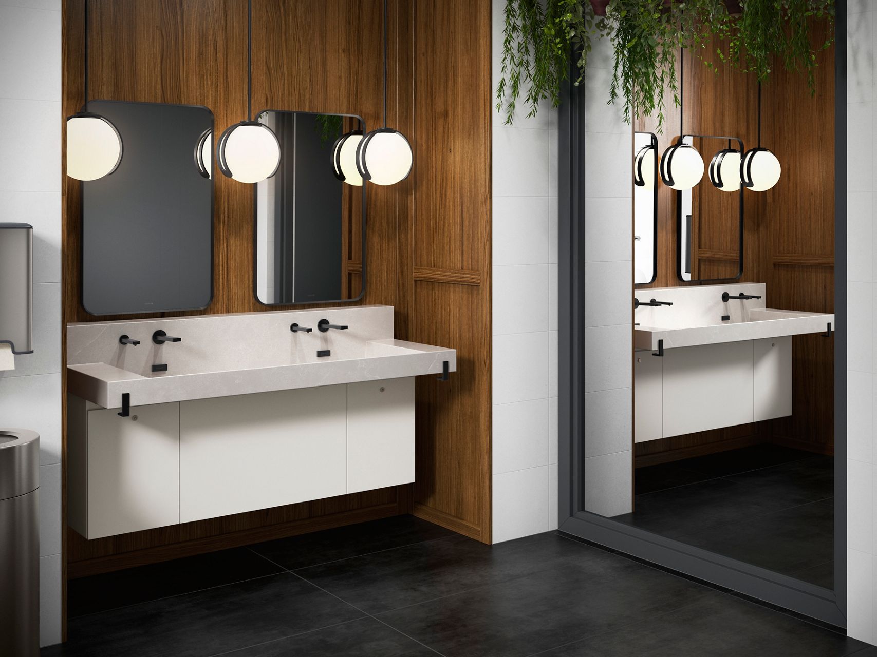 Contemporary bathroom with a white double sink vanity, black faucets, mirrors, lights, wooden accent wall, and floor-to-ceiling mirror with hanging greenery.