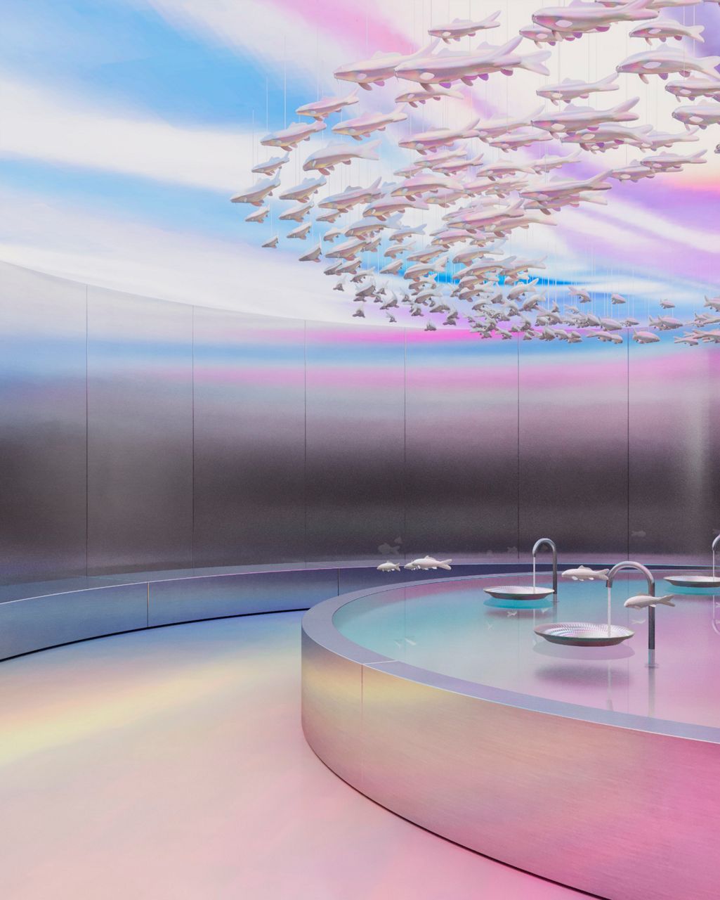An image showcasing the Underlight installation with pearlized basins and sculptural fish figures floating above circular pools in a modern, iridescent environment designed by Harry Nuriev and Crosby Studios.