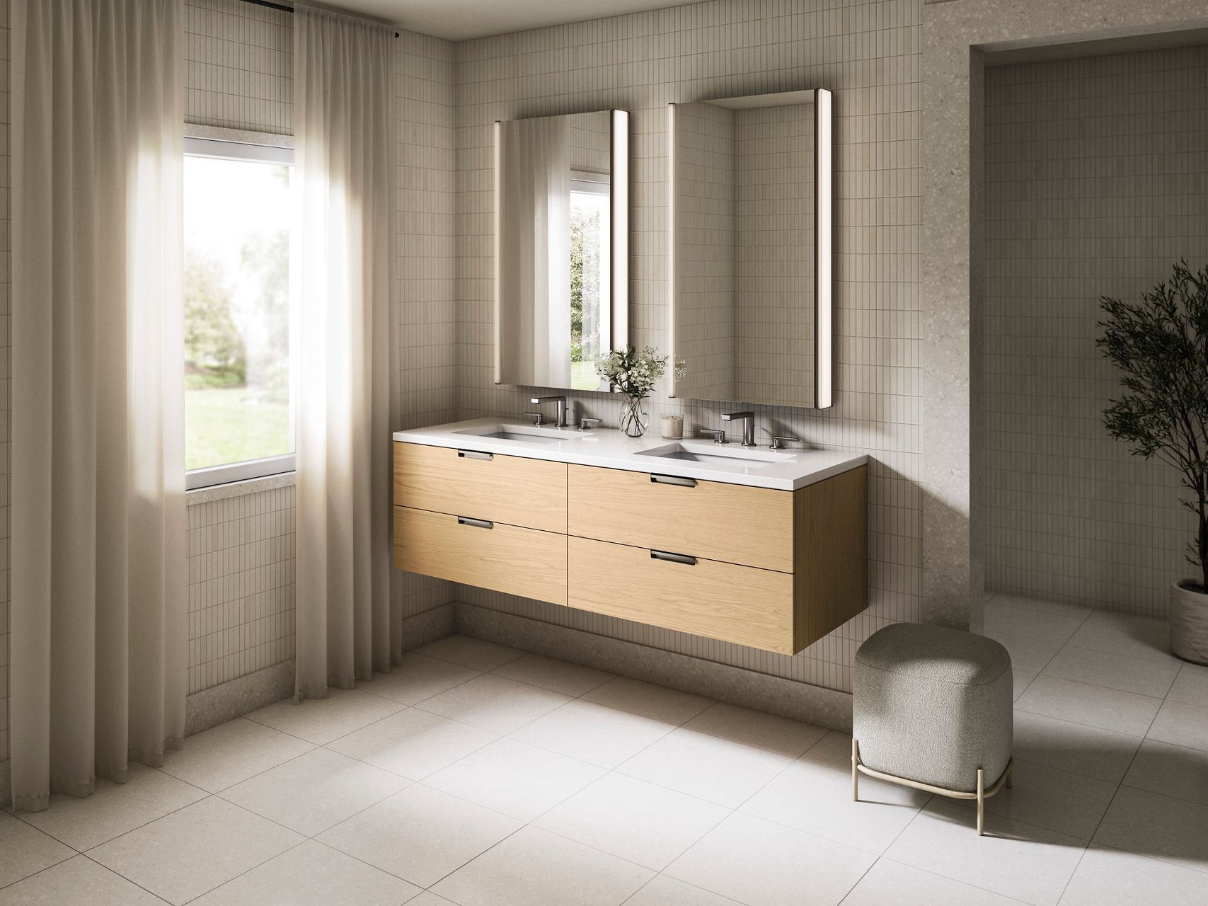 Bathroom interior featuring a light wood double vanity with a white countertop and dual rectangular mirrors mounted on tiled walls.