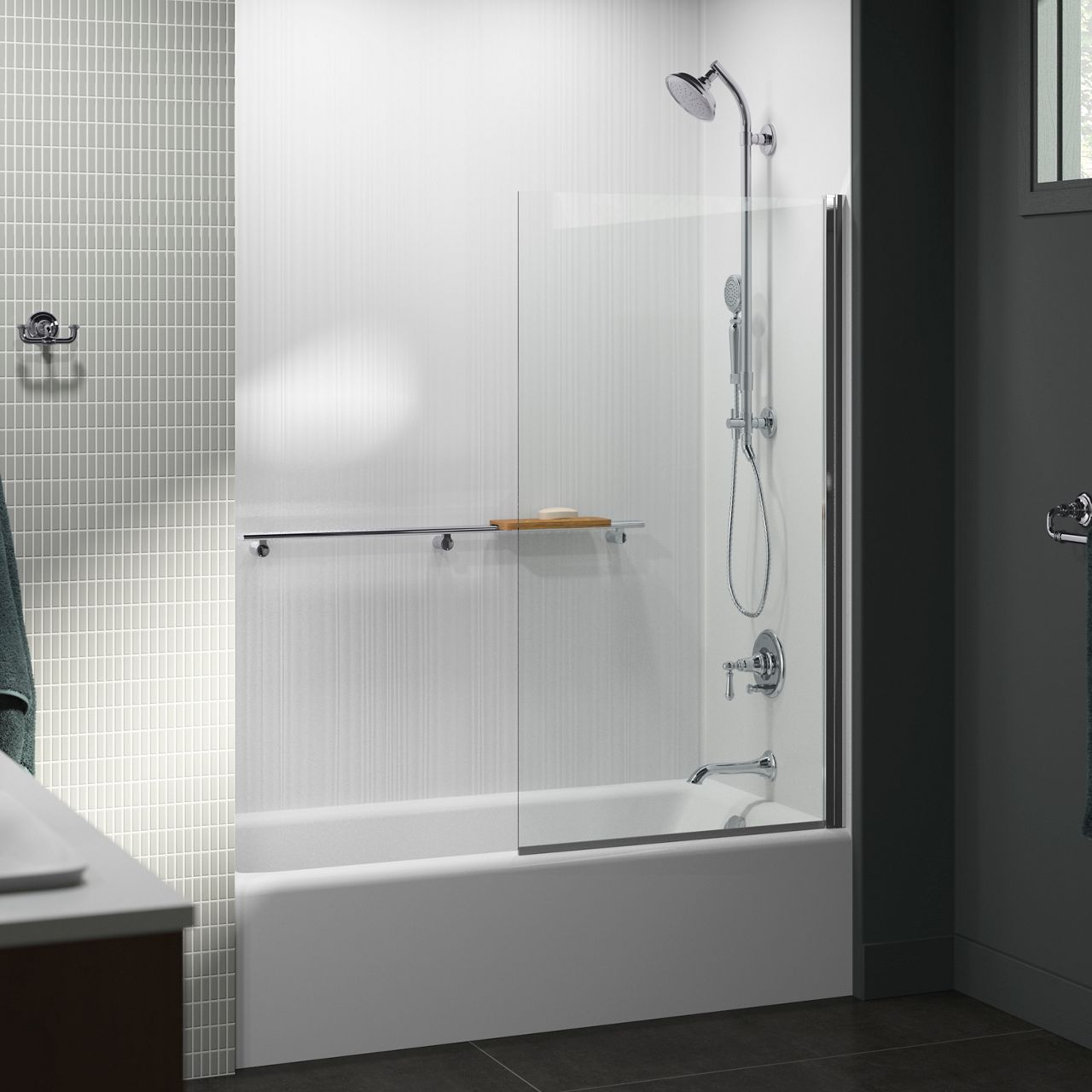 A clean and minimalistic shower with a sliding glass door, integrated grab bar, and built-in shelving for accessibility and design.