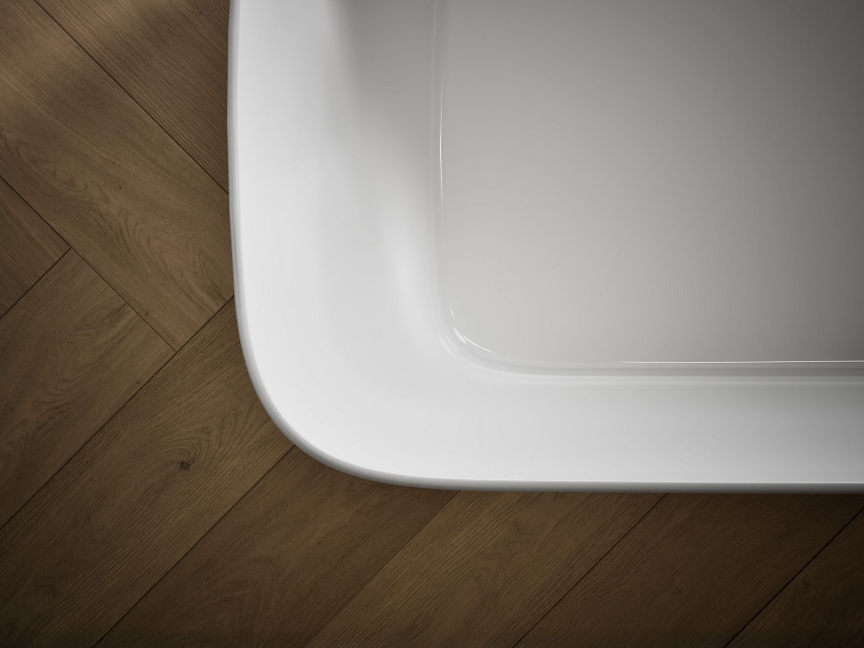 KOHLER Lithocast material bathtub with warm wood in the background.
